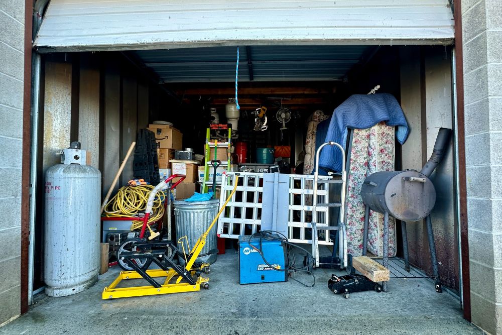 An outdoor storage unit packed with diverse items, illustrating the typical contents handled by junk removal services in San Francisco.